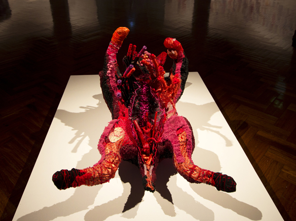 Vessel, Mai Nguyen-Long 2013, avian mesh, used clothes, fabric, found objects, maps, beads, organic material, papier mache, 65 x 77 x 128 cm